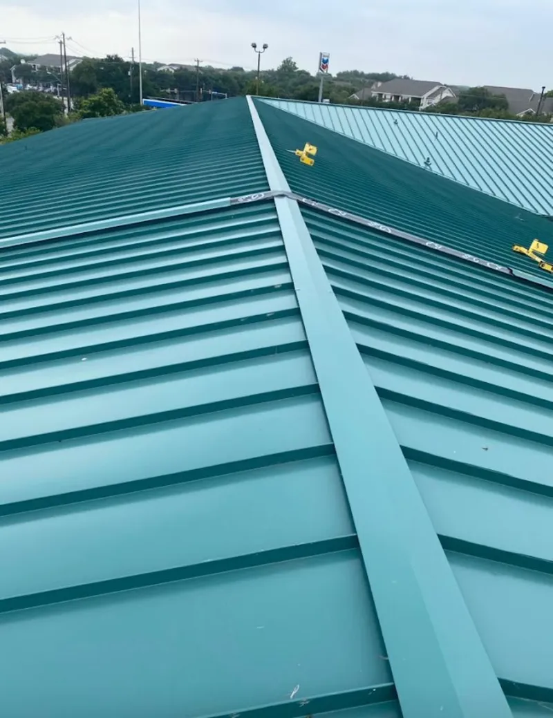 Green commercial metal roof ridge and valley for Metal Roof Repair in Verde Village