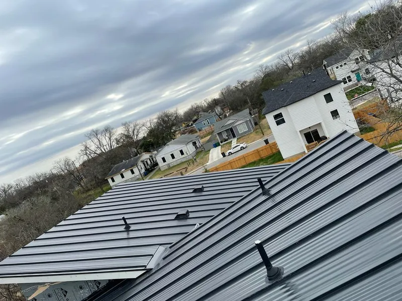 Standing seam metal roof panels with vents for Skylight Repair in Verde Village